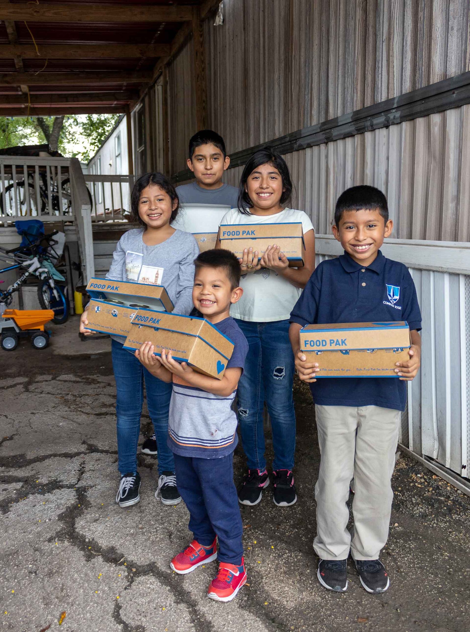 Giving Tuesday 2025 - Kids with Food Pak