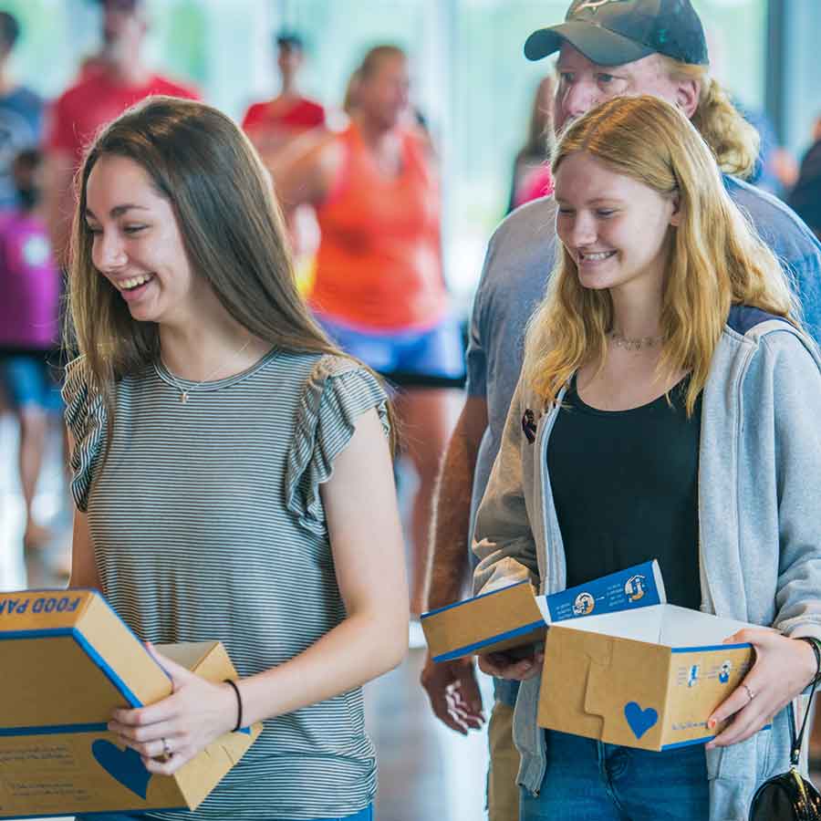 Serve with Children's Hunger Fund as a Church or Group - Sisters