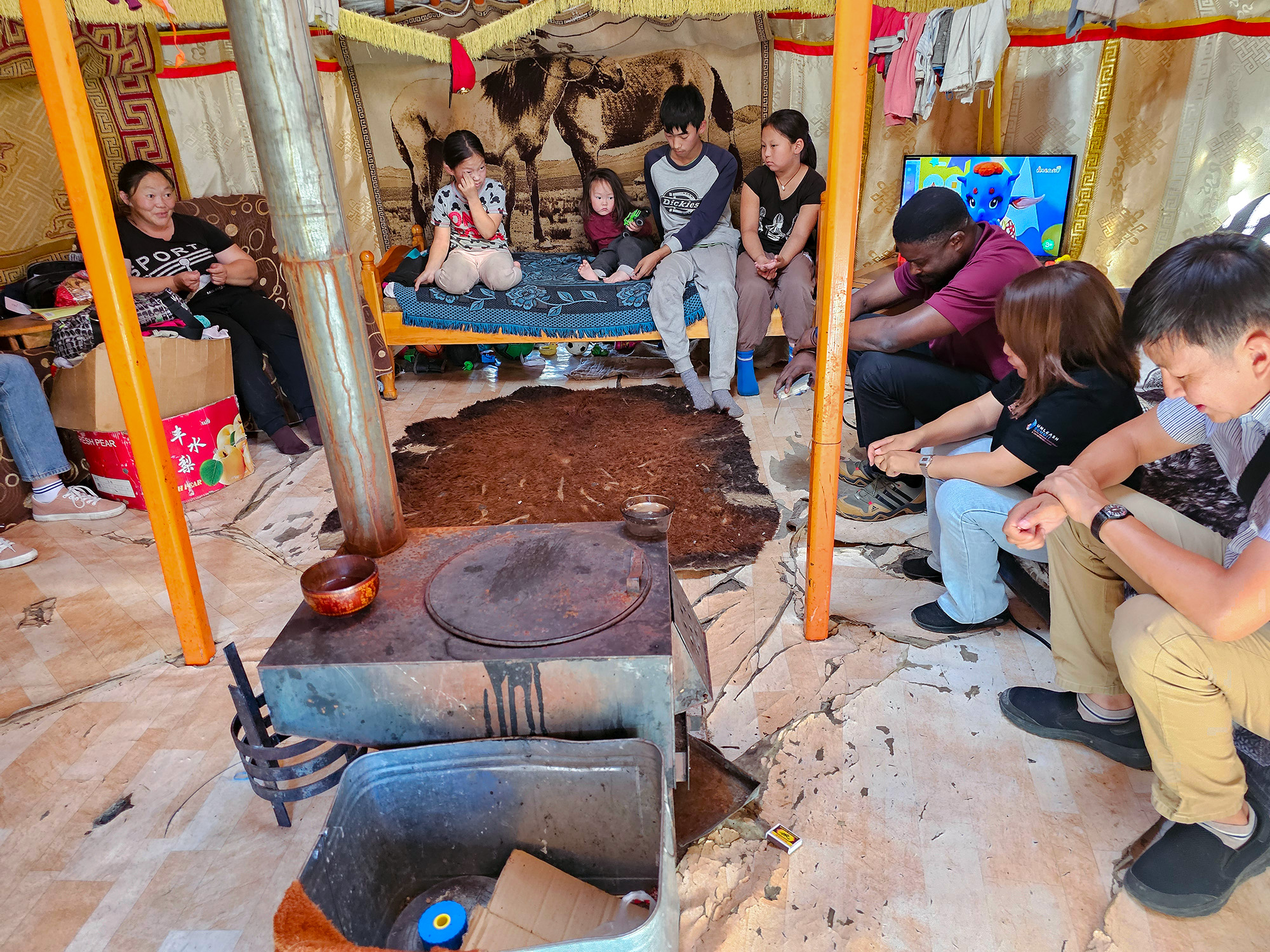 Harold and church volunteers with a recipient family in Mongolia