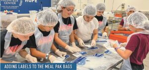 Adding labels to the Meal Pak bags