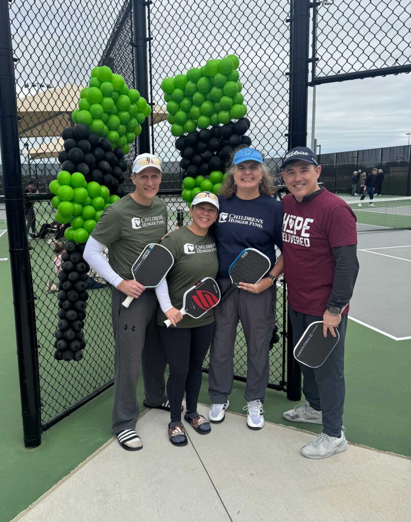 Children's Hunger Fund team members representing CHF at the P-Town Throwdown pickleball tournament in Prosper, Texas.
